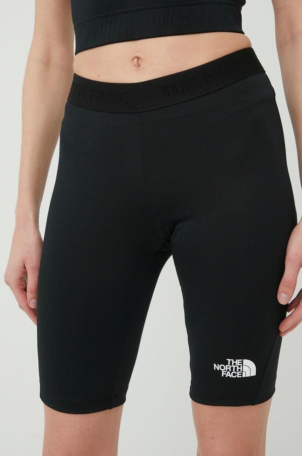 Sportovní šortky The North Face Mountain Athletics dámské, černá barva, hladké, medium waist