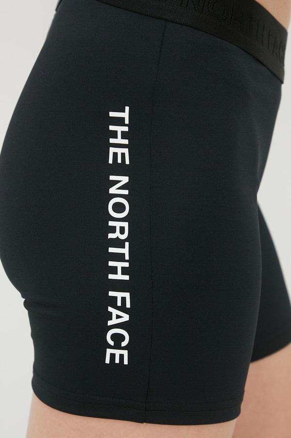 Sportovní šortky The North Face Mountain Athletics dámské, černá barva, s potiskem, medium waist