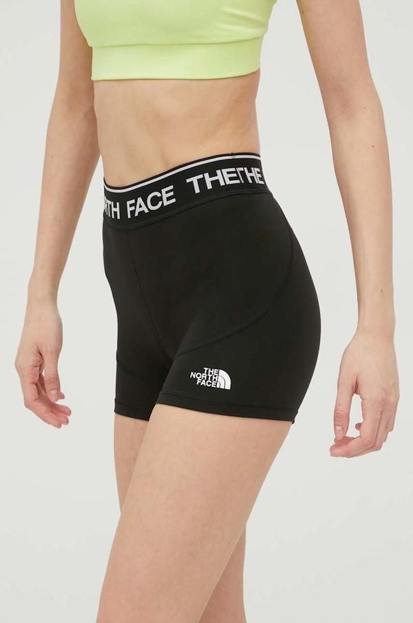 Tréninkové šortky The North Face dámské, černá barva, hladké, medium waist