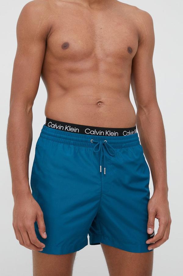 Plavkové šortky Calvin Klein tmavomodrá barva