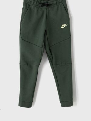 Dětské kalhoty Nike Kids zelená barva, hladké